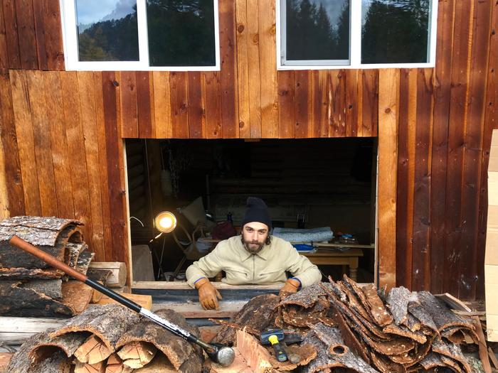 Removing a broken window from cooper cabin for repairs 