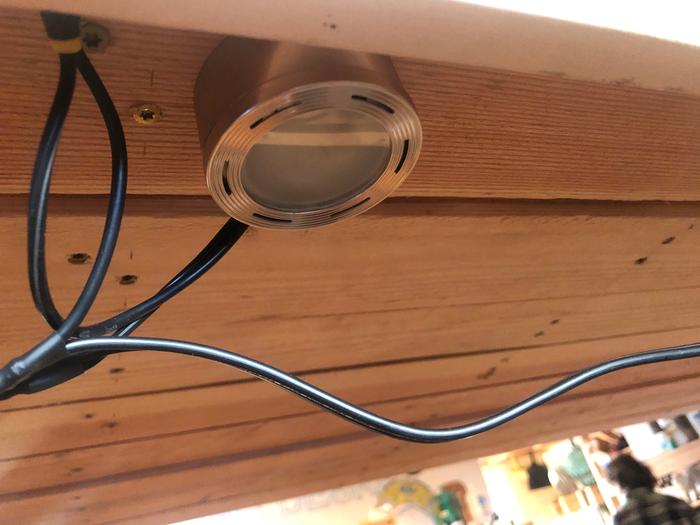 These are the little puck lights that will also keep the noggins warm 
