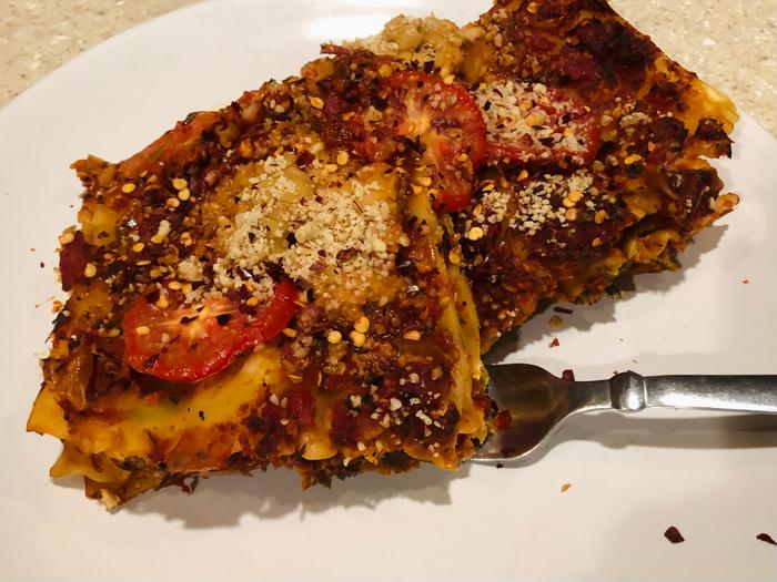 Yum. With a white bean based cheese filling and an almond parm on top