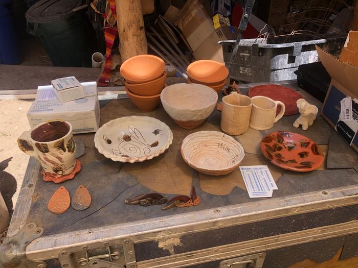 Some attendee-made pottery that came out of our new rocket kiln!