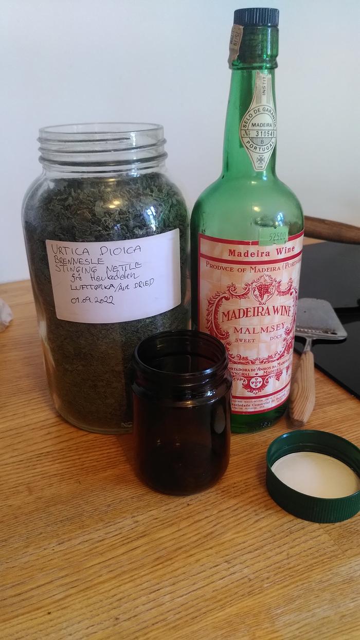 Ingredients and mixing jar. Bottle says Madeira, means moonshine. It`s basically airplane fuel.