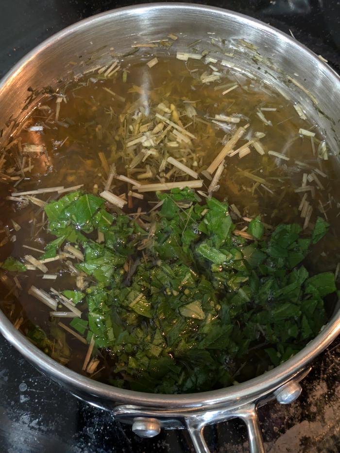 Tulsi leaves added to the pot with oatstraw