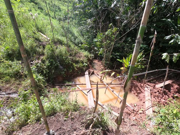 small pond on hillside