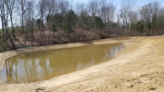 big clay hole for pond