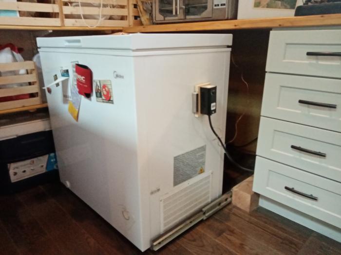 Converted chest freezer on slides