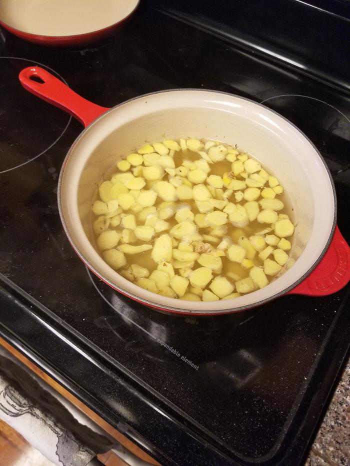 simmering ginger with sugar