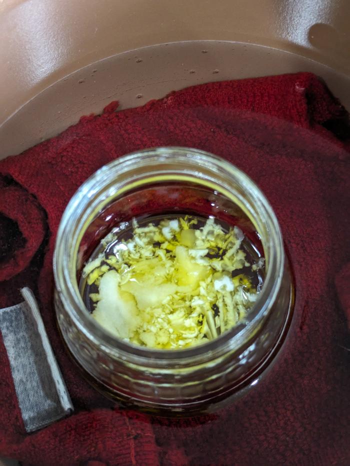 Wax and shea butter in rosemary oil