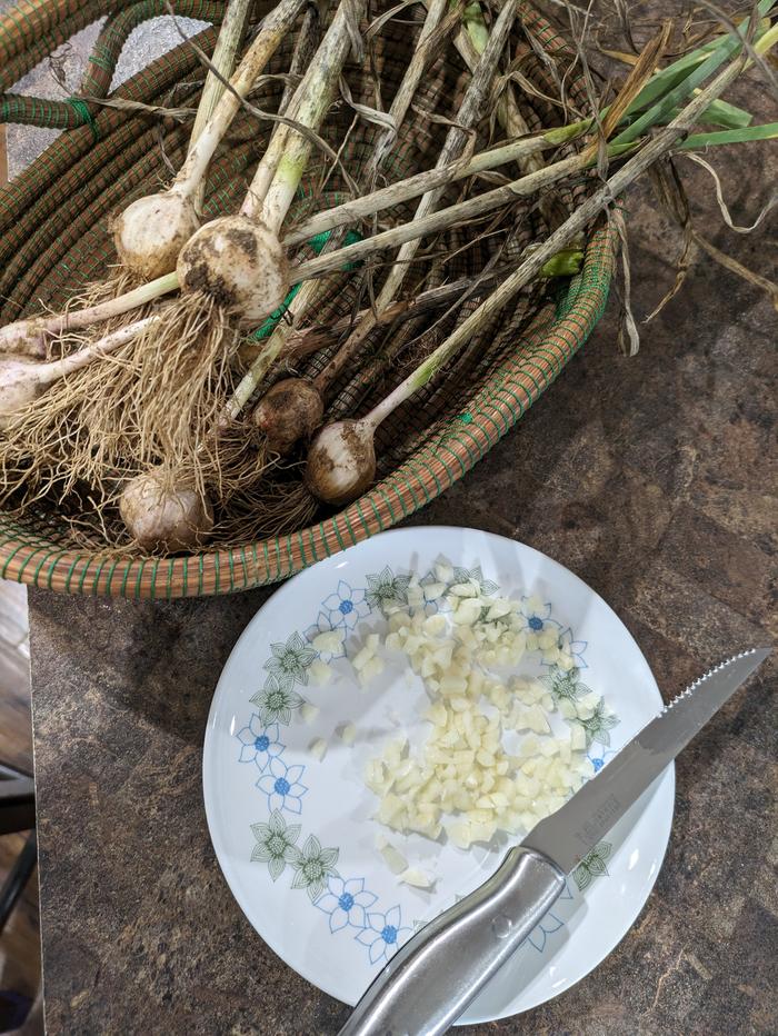 One freshly minced garlic head