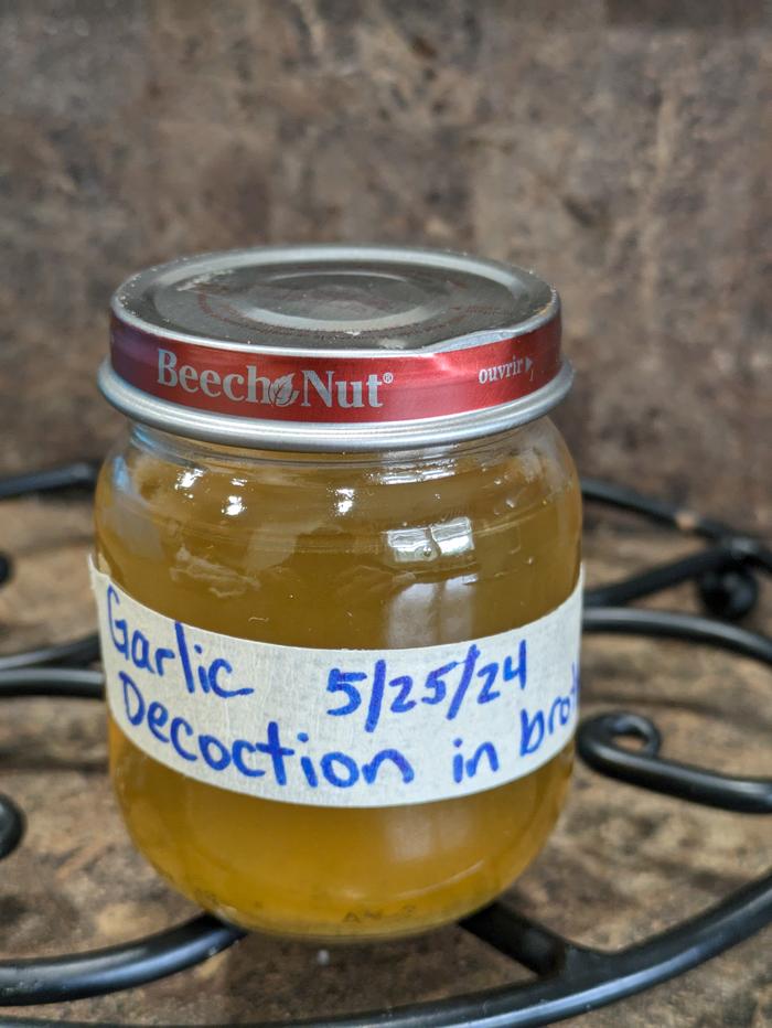 Labeled jar - Garlic decoction in broth