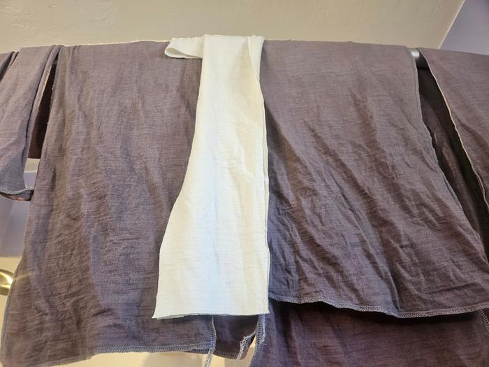 Wool with a strip of undyed fabric, just after washing