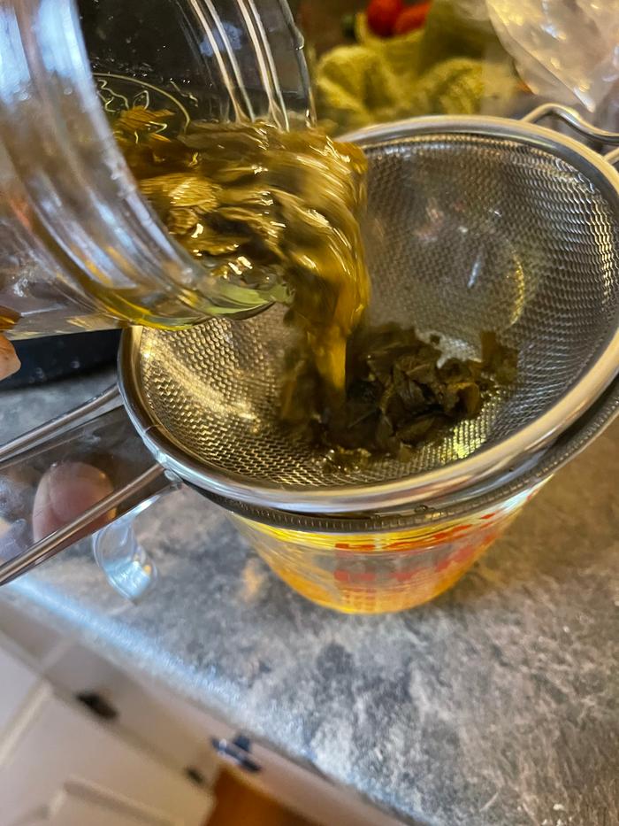 Strain the herbs out after weeks of steeping