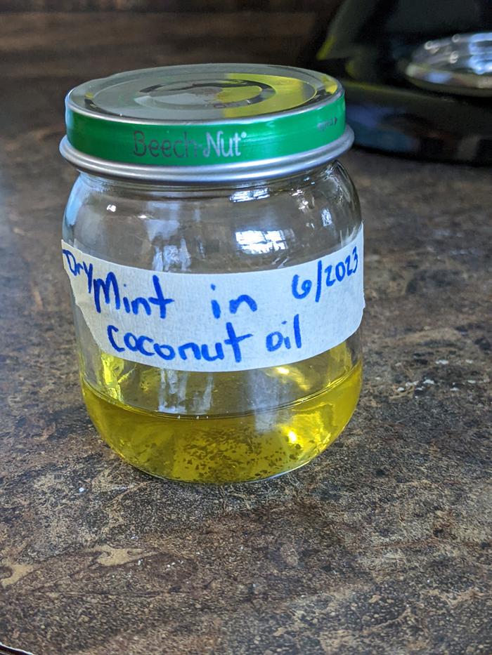 The finished jar of mint oil