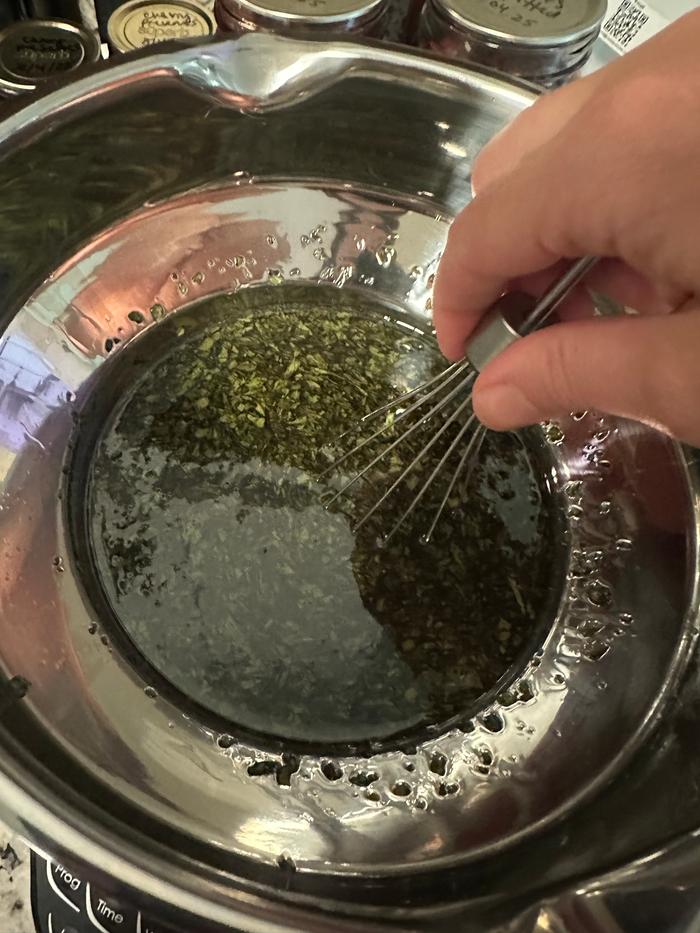 I blended the leaves & oil, then put them in a double boiler on low for 5 hours, making sure temp stayed around 120