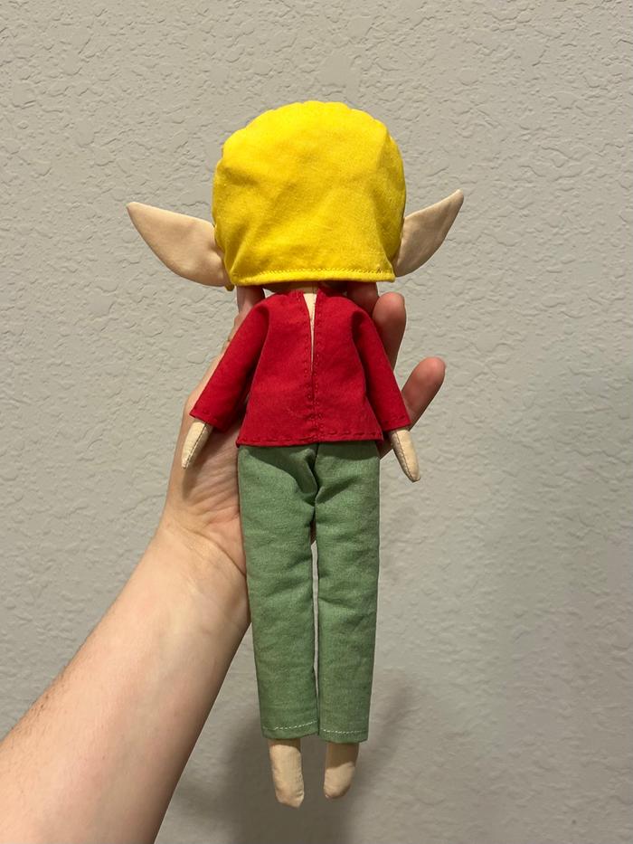 back of handcrafted stuffed doll