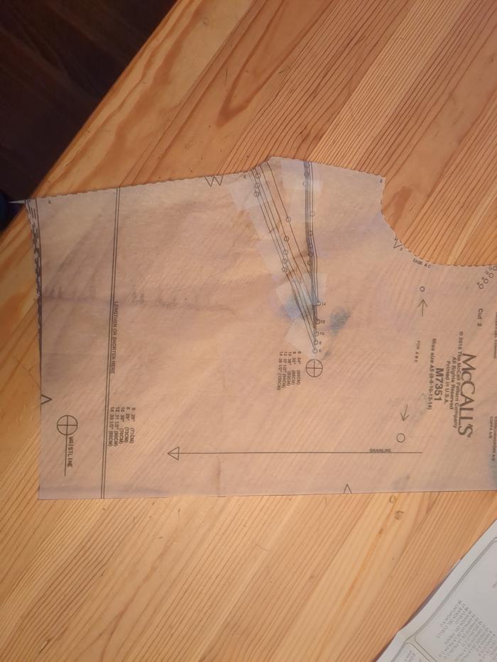 Started cutting out pieces. Wasn't sure if I was supposed to cut out this piece (called a "dart"?).