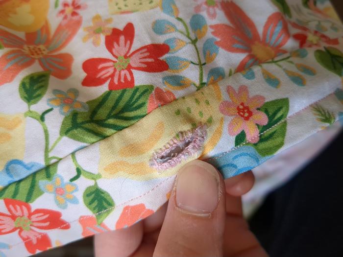My first buttonhole. This was nerve-wracking cutting into the fabric worrying that it would be too big.