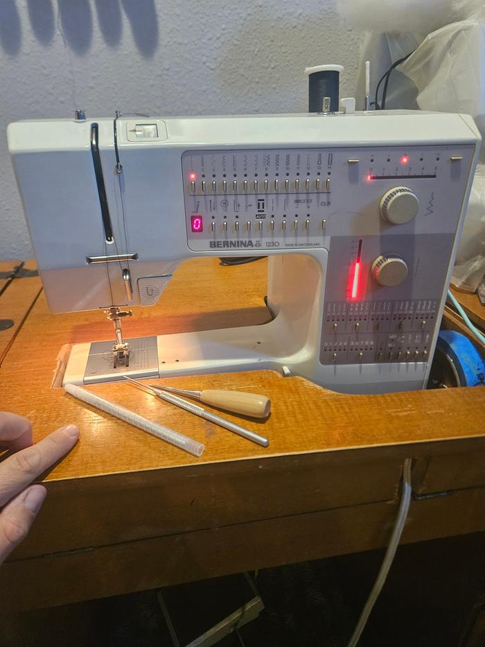sewing machine and awl and unpicker and marker