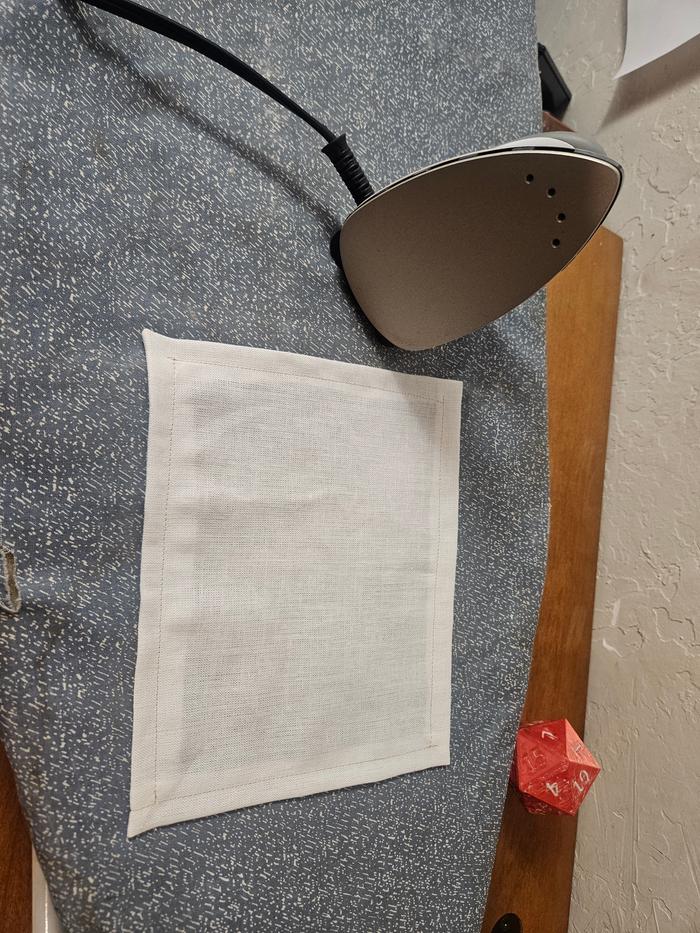 one of the pockets, about to be attached