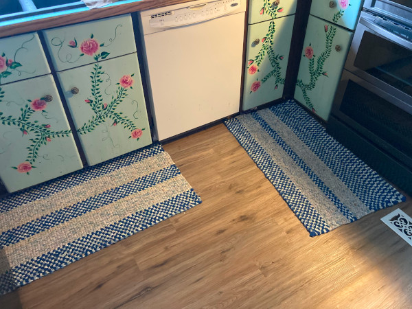 two rugs in the kitchen
