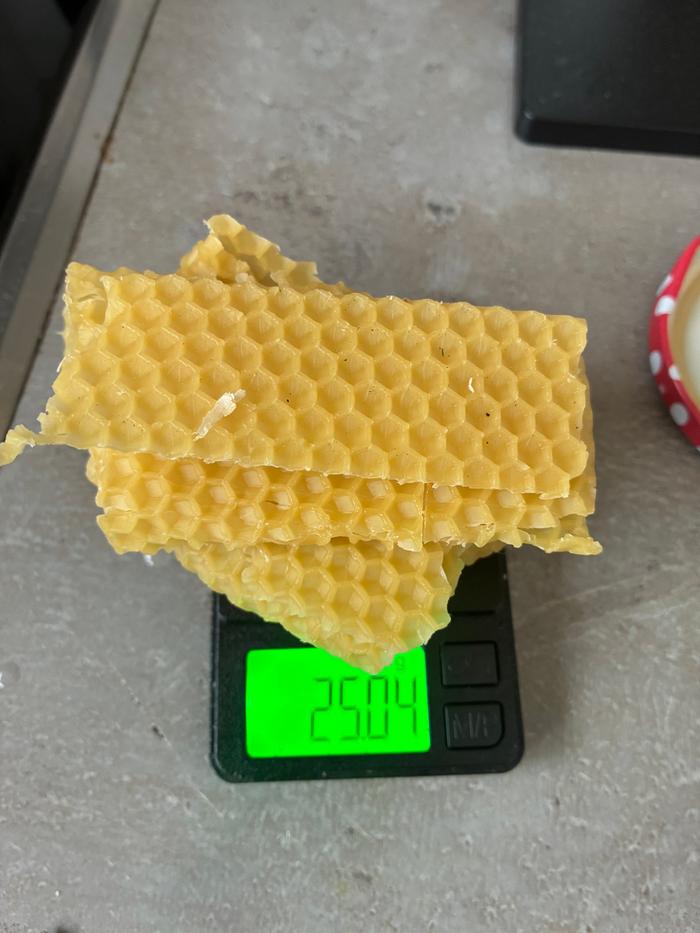 Weight of beeswax.