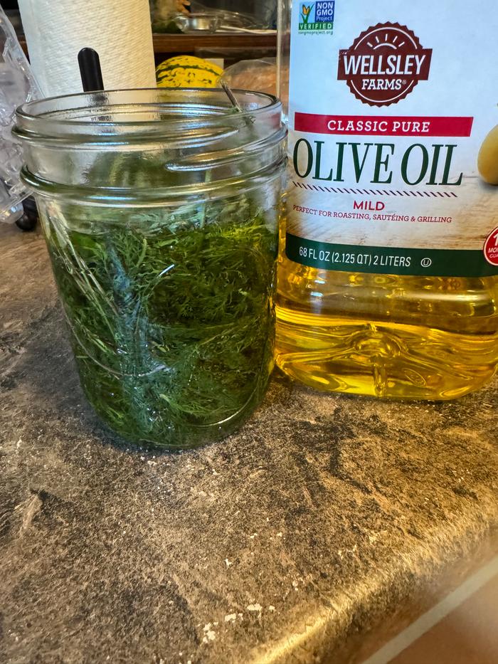 Herb in olive oil solution