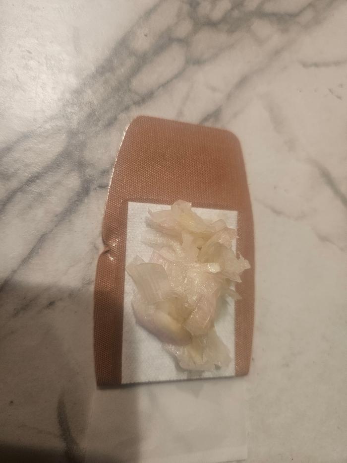 Smashed onions on a bandaid