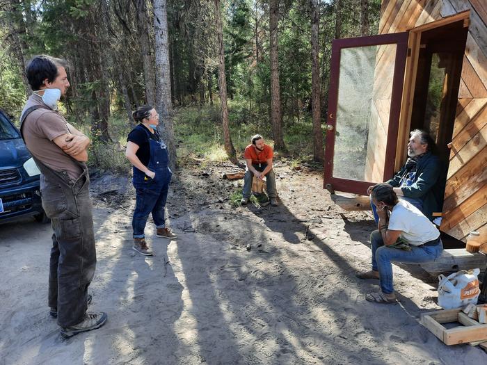 Sauna Build team discussing theory and design