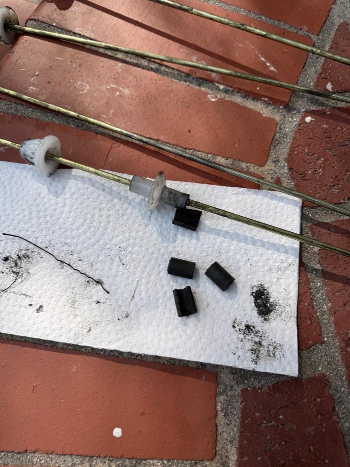 I removed the black foam that is supposed to go between those plastic caps but all were wedged inside the piece on the right