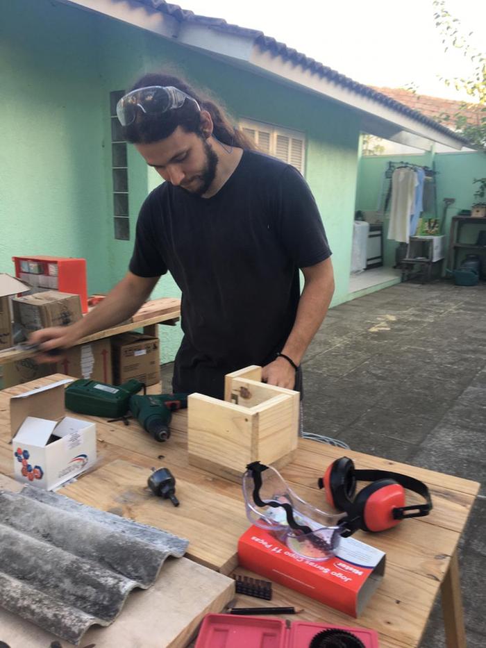 This is me assembling the birdhouse.