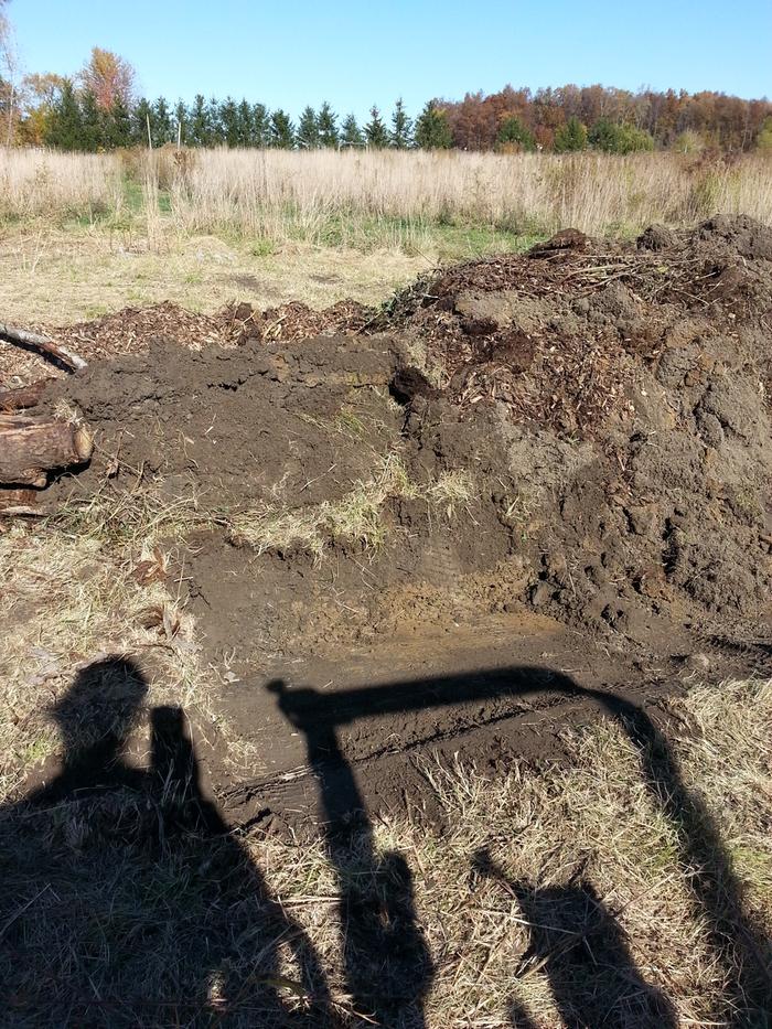 and scooped up topsoil
