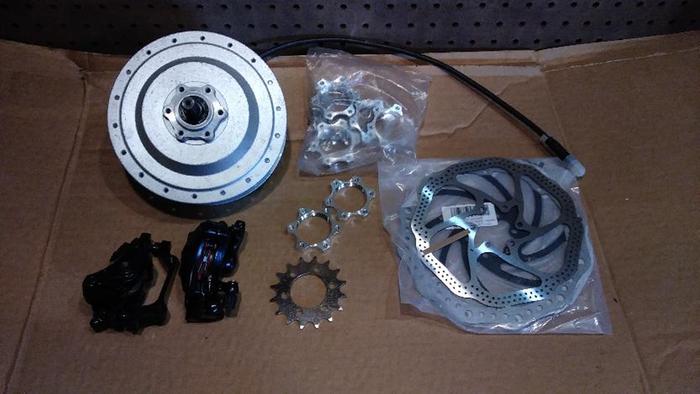 Hub motor, brakes, spacers, and sprocket