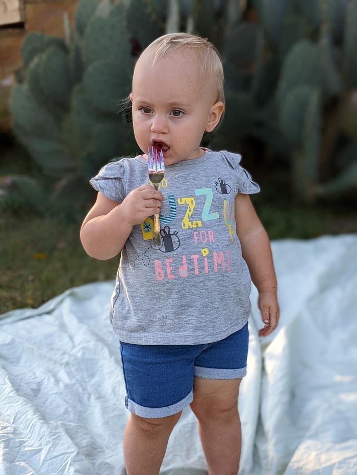 The taste wasn't bad, so she tried the whole bite.
