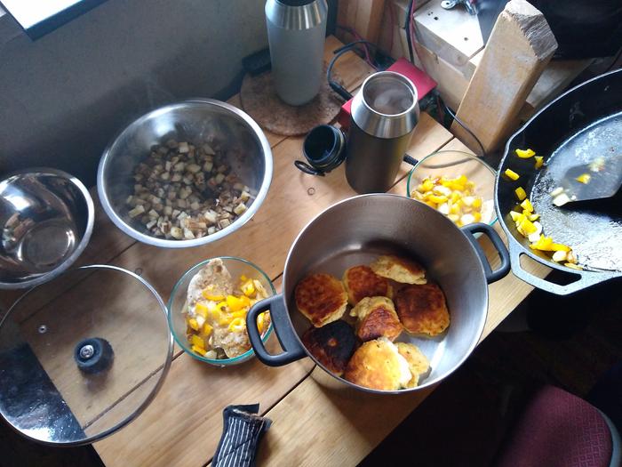 Fried potatoes, yellow bells, onions a couple eggs and biscuits. Solid breakfast 