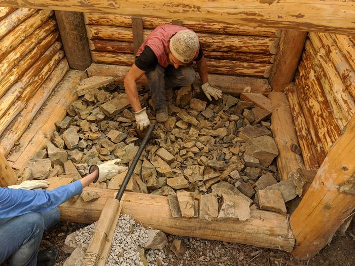 some raise the roof - we raised the floor. Big rock we dug up all over, then some of the more uniform sifted stuff with a layer of 1/4" size