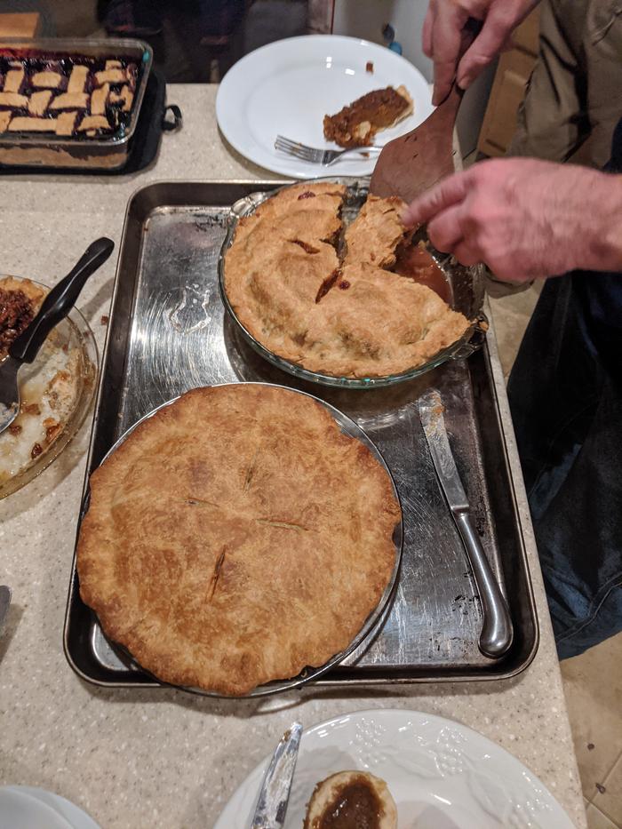 Unfortunately I didn't get a pic of the sausage stuffing I made for us omnivores but here's my apple and peach mango pies. 