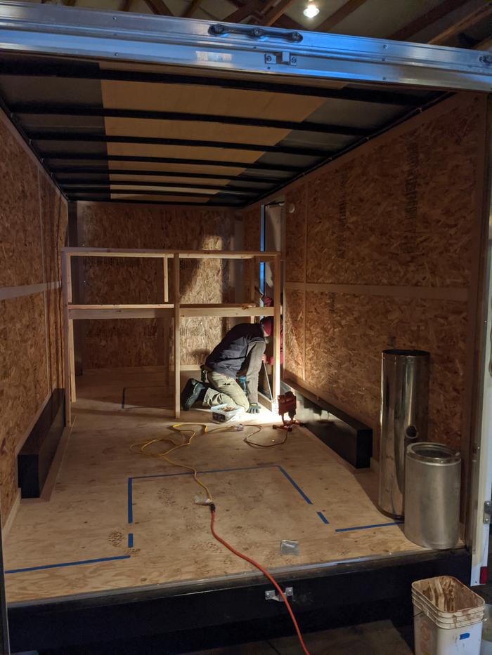 Stephen and Grey working on the trailer shelves. 