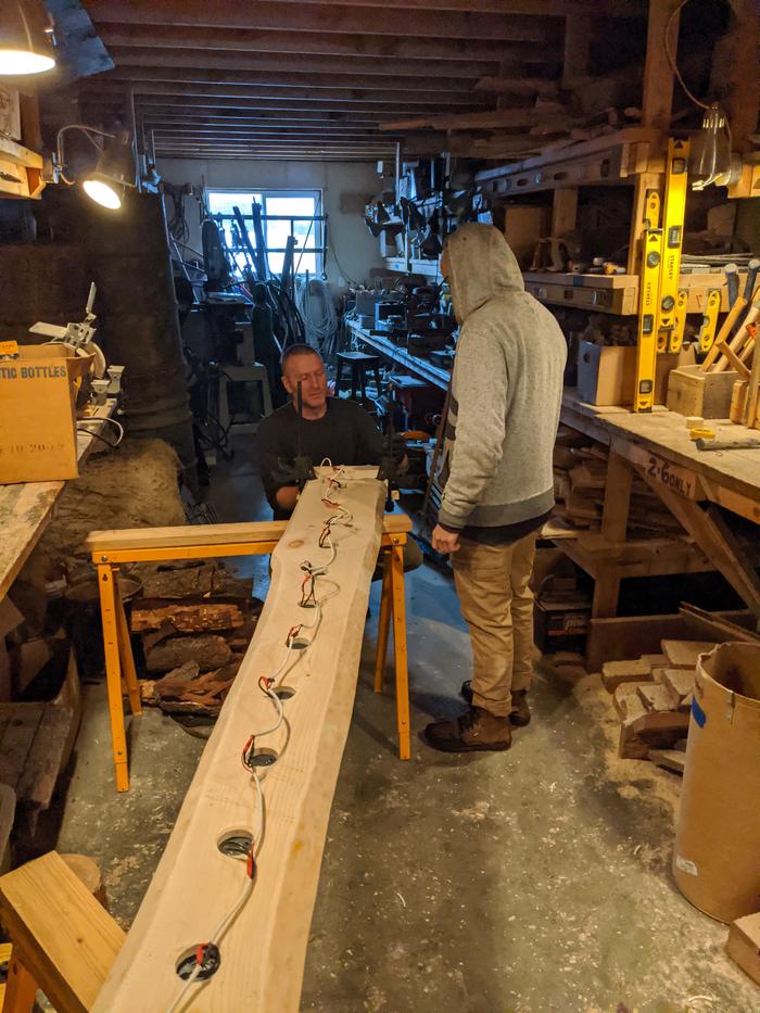 Here's Steve and Daniel installing the mounting points for the slab'delier. 