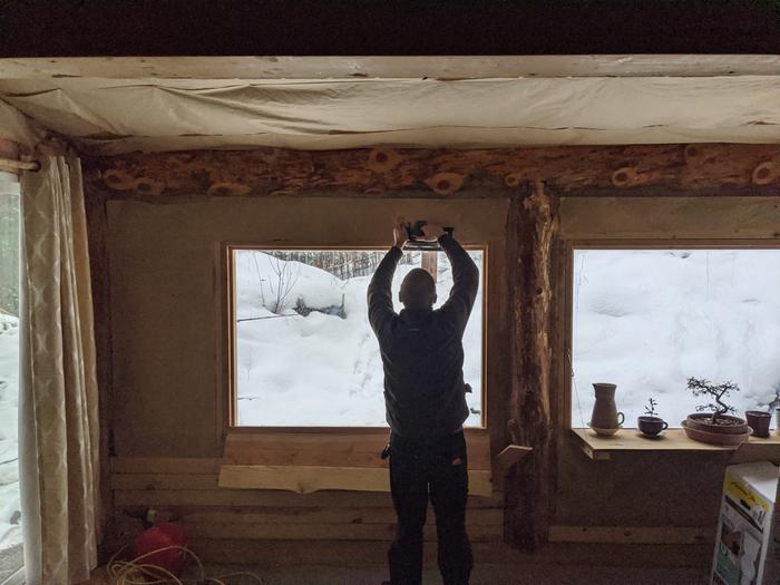 Steve starts on the double pane project in the solarium. 