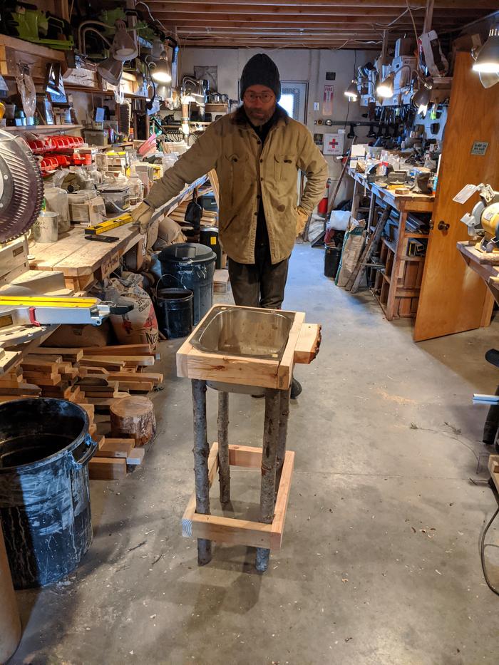 The idea was proposed to use round wood legs for this sink build. 