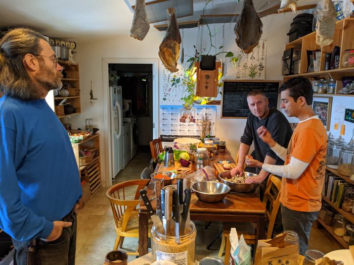 A few of us getting some knowledge and direction about kraut from our ferment lead, Austin. 