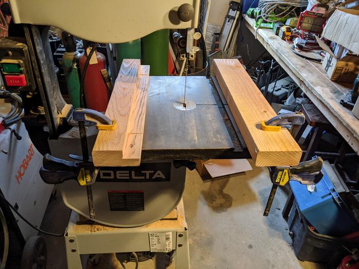 I need a way to make a guide for our band saw. I clamped a couple 2x4 down to maintain the level. 