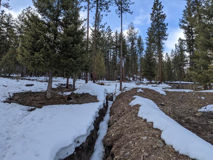 Dragging logs down a snow covered mountain will have one sleeping like the dead later that night. 