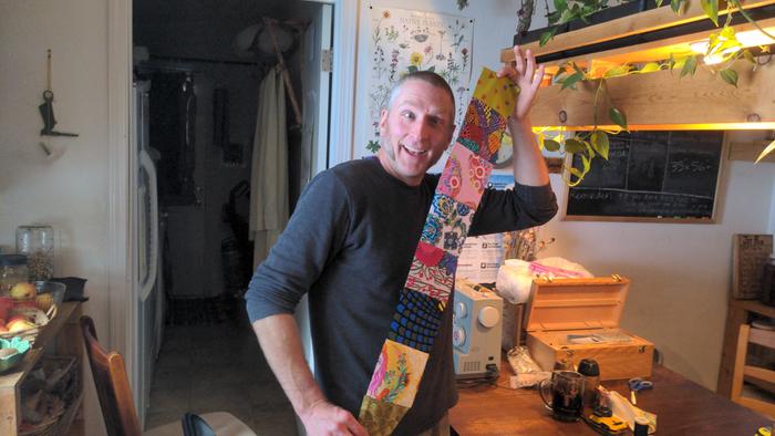 Stephen finishing a strip for the quilt.