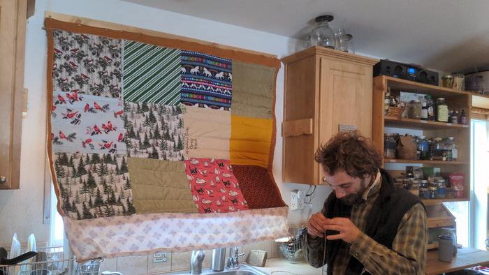 Refreshing the hardware on the kitchen quilt curtain