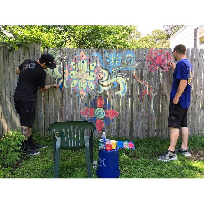 Fun quick chalk doodles to pretty up a fence for a couple days.