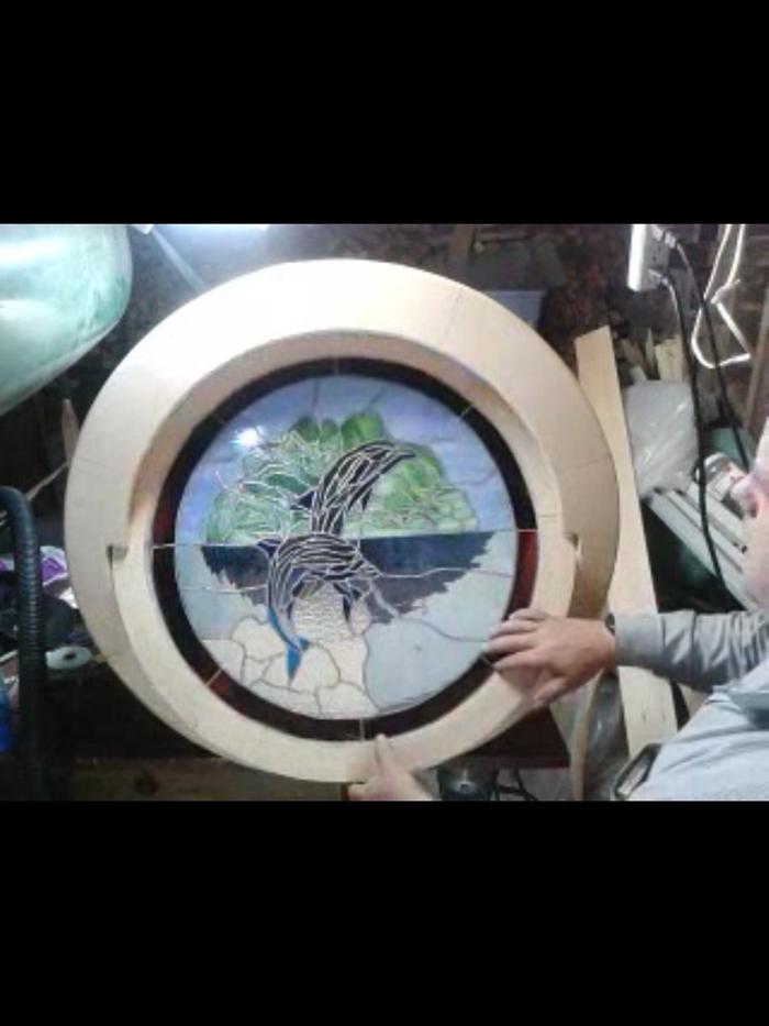 homemade round window and stained glass