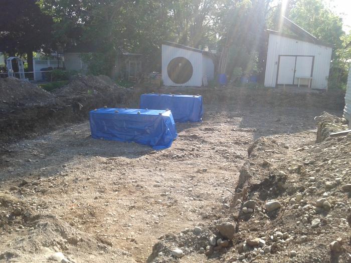 insulated panels in pit covered with plastic