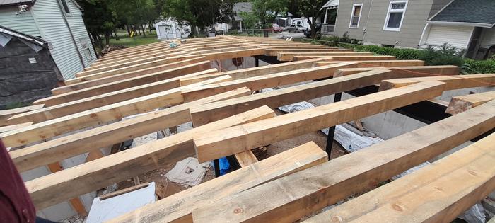 wooden beams placed over i-beam