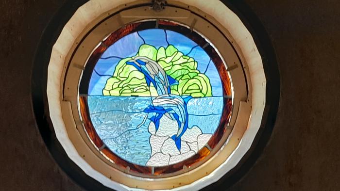 beautiful, openable round stained glass window