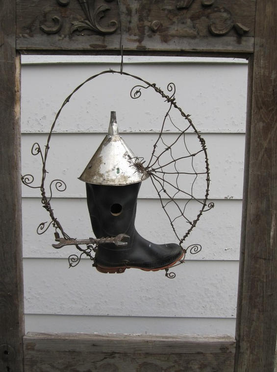 Rusty barbed wire yard art - boot spiderweb birdhouse